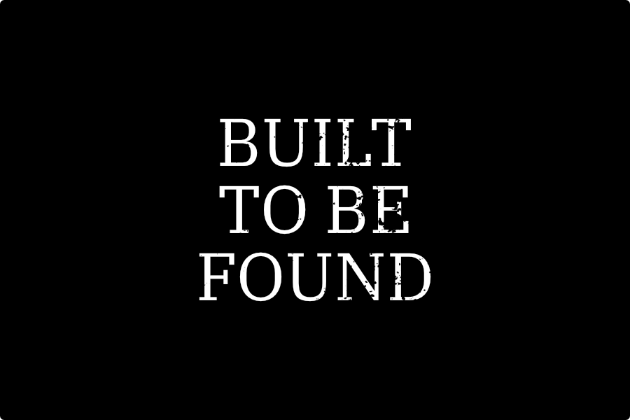 white text on black background, built to be found